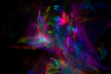 Multicolor abstract portrait of young woman on subject of creativity, imagination and art.