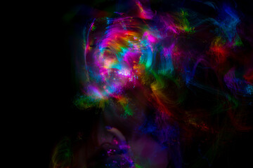 Multicolor abstract portrait of young woman on subject of creativity, imagination and art.