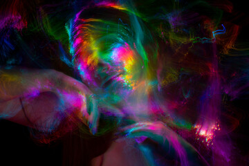 Multicolor abstract portrait of young woman on subject of creativity, imagination and art.