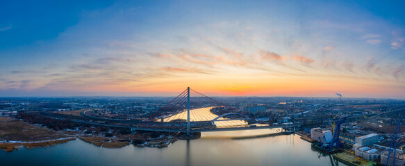 Cable-stayed bridge on the Vistula river in Gdansk at sunrise. Poland