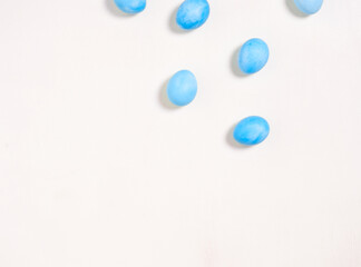 Easter eggs on white background. Easter concept. Top view.