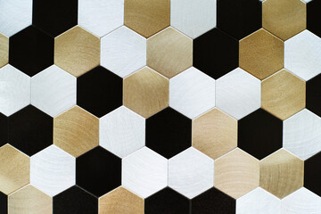 Metal tile for wall cladding in the form of honeycombs. Decoration material made of small hexagonal...