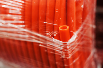 Plastic hose in a roll for installing underfloor heating. Sale of equipment for home heating in a...