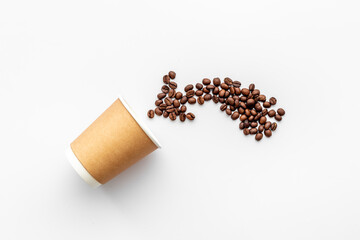Paper coffee cup with roasted beans. Take away coffee.