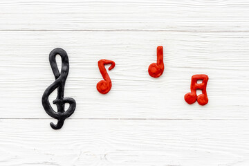 Abstract music notes made of rubber, top view. Music background