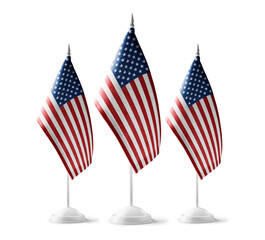 Small national flags of the United States on a white background