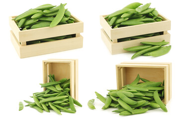 freshly harvested sugar snaps in a wooden box on a white background