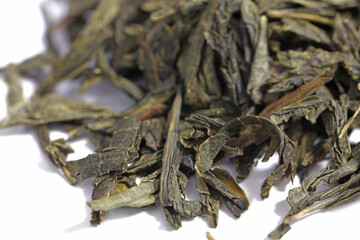Green tea dried and rolled leaves