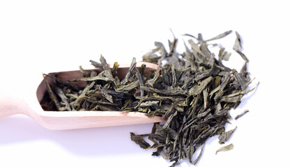 Green tea dried and rolled leaves