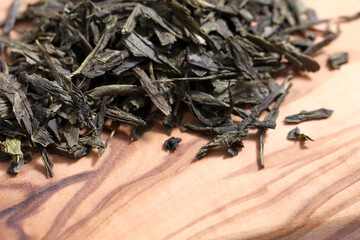 Green tea dried and rolled leaves