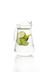 Sassy water or water with cucumber and lemon in jar isolated on white background