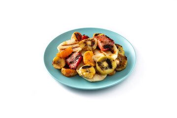 GRILLED FRUIT on a blue plate isolated on white background