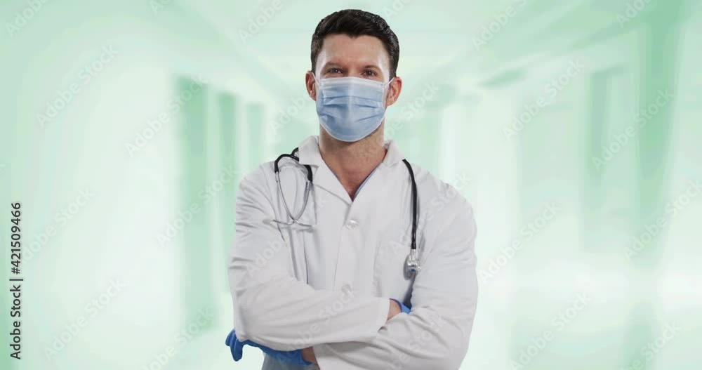 Sticker portrait of caucasian male doctor wearing face mask against white background