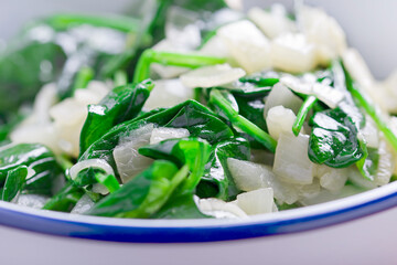 spinach with garlic in a bowl
