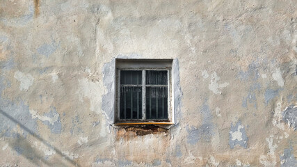 Fototapeta na wymiar old window in the old wall
