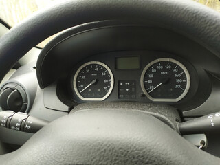 Close-up view in car dashboard with instruments of measurement in car cockpit with instrument panel...
