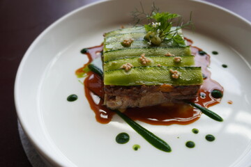 Braised lamb belly; ratatouille, zucchini, mustard pickle, parsley puree

