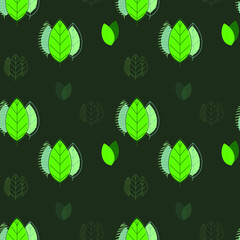 Bright green leaves on a dark background