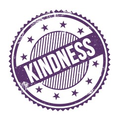 KINDNESS text written on purple indigo grungy round stamp.