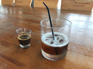 beer and espresso coffee on the wood table
