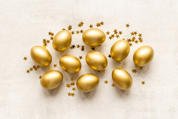 Golden Easter eggs with decoration. Wealth and good luck concept.