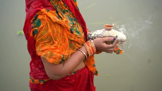 Woman celebrating chhath festival in Bihar, India 
