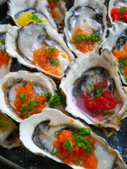 International Buffet - Raw oyster with tobiko