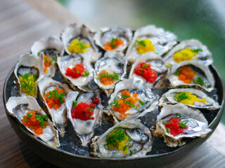 International Buffet - Raw oyster with tobiko