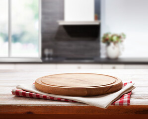 Pizza board, with napkin on the kitchen table. Top view mockup