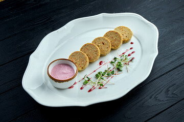 Gefilte fish - is a dish made from a poached mixture of ground deboned fish, such as carp, whitefish, or pike served on white plate. Shabbat and Passover вшір