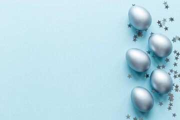 Silver Easter eggs with decoration. Wealth and good luck concept.