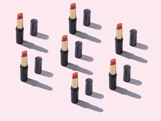 Obraz premium Red lipstick make up beauty pattern on pink background