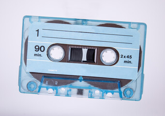 A blue cassette tape isolated