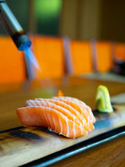 Japanese Menu - Burned Salmon Sashimi on the bamboo plate © nuchun