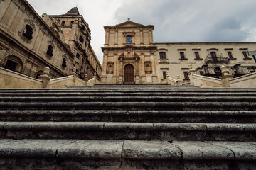 Fototapeta premium Stairs in front of St Francis of Assisi church in historic part of Noto city, Sicily in Italy
