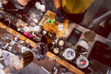 On the table of people mixing drinks at a high angle Inside the coffee shop