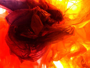 illustration of abstract flower petals from used plastic orange color