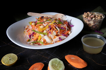 Healthy Fruits and vegetable salad photoshoots on dark background.