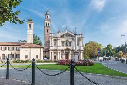 Traffic island with flowers, urban landscaping. Saronno, Italy and the Sanctuary of Our Lady of the Miracles declared part of the European Heritage. Was built between 1498 to beginning 1600