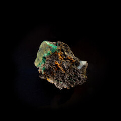 Malachite inside chalcedony mineral isolated on black background. For geology or mineralogy websites, stone collection catalog, Natural Science museum wall charts or posters