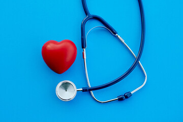 close-up. stethoscope and a heart on a blue background.