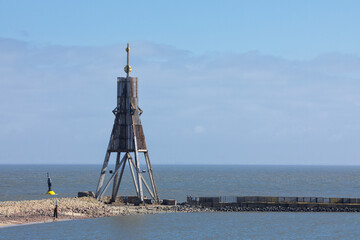 Fototapeta na wymiar Kugelbake beacon, landmark of the city of Cuxhaven