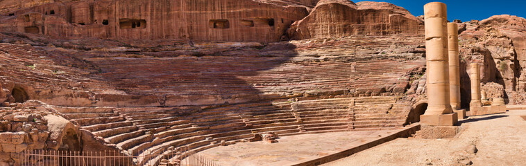 Panorama view of the Nabataean Amphitheater at Petra historical site in Jordan.