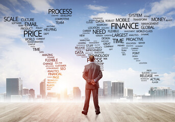 Motivation and inspiration concept with modern cityscape and businessman observing it