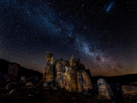 Quartzite formation against the Milky Way in the Valley of the Red Gods, Sanddrif, Cedarberg mountains