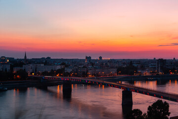 View of Varadin Bridge over Danube river and Novi Sad city during sunset