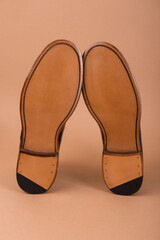 Leather soles of a classic pair of shoes