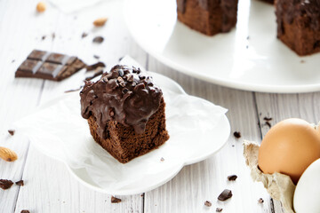Fototapeta na wymiar Chocolate Cube pound cake set on cafe table.