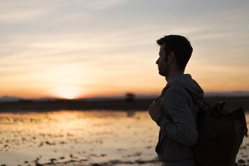 man with travel backpack