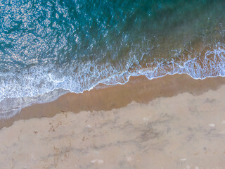 Aerial photography coastline beach waves